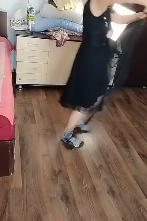 Amateur Woman Has Fun Trying on Clothes and Cutting Them.