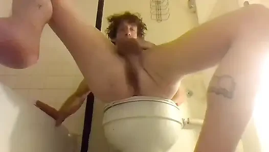 Stroking While Smoking, on a Toilet