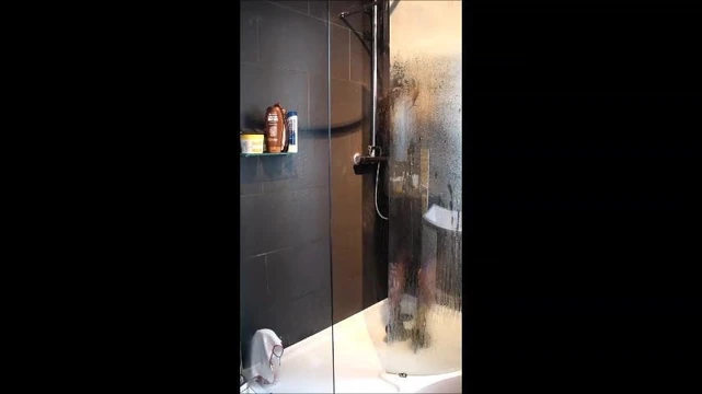 Wearing my wifes dress in the shower