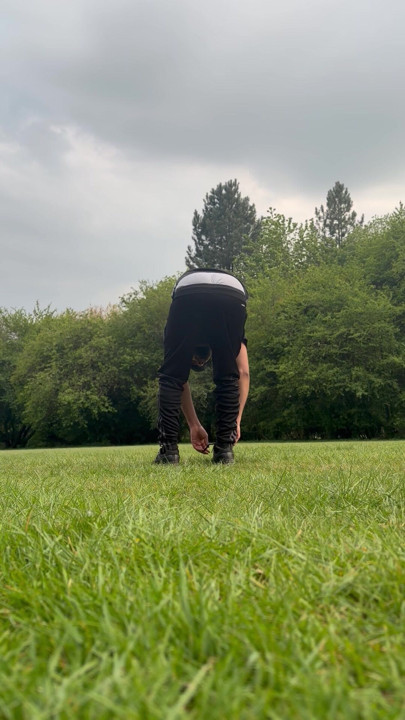 A twink boy showing dick in park