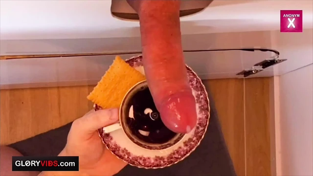 Early in the morning at the gloryhole there is sperm, cock and coffee