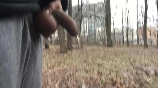 Peeing at the city park in public area