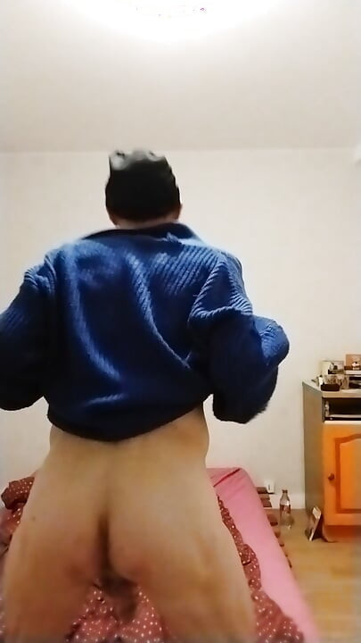 Sensual guy in a little blue sweater...