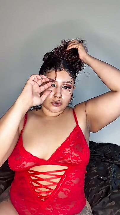 Sexy Latina Playing Solo