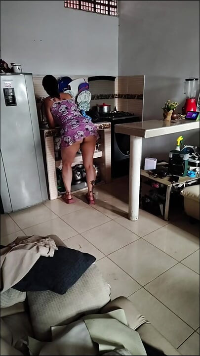 Stepmom masturbates in the kitchen with her huge tits