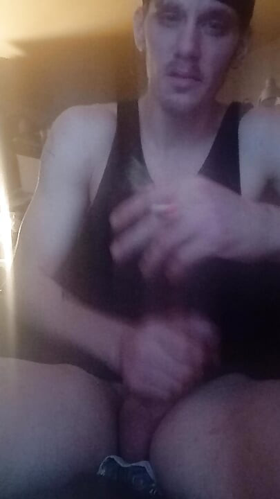 Sunny Jerks off and Smoke a Cig at Same Time