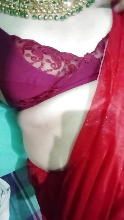 Indian Gay Crossdresser Bottom Gaurisissy Pressing Her Big Boobs and Feeling Horny in Red Saree with Heavy Jwellery