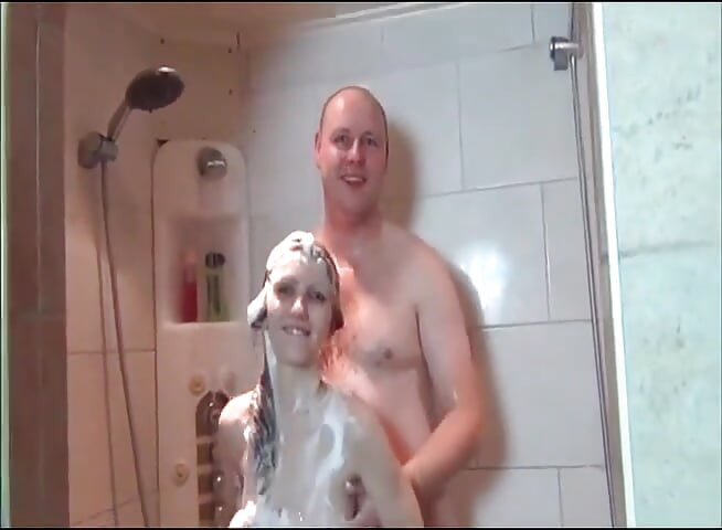 Sexy brunette teen wanks guy's pecker in the bathroom