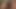 A beautiful blonde titty fucks with her big tits and licks
