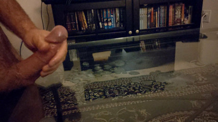 Blowing my load onto the glass table