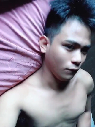 asian twink filming only his cute face while jerking off