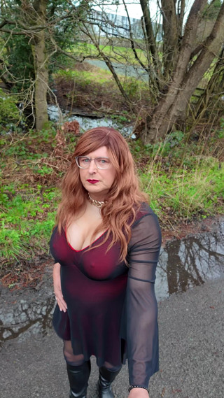 Sexy Crossdresser kellycd2022 in black pantyhose and boots out for an afternoon drive thumbnail