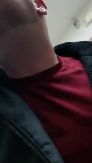 slut films himself sucking off two hunks in a bathroom