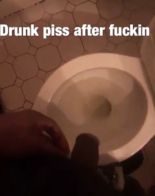 Black cock taking a piss thumbnail