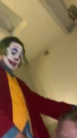 Harley Quinn getting peed on