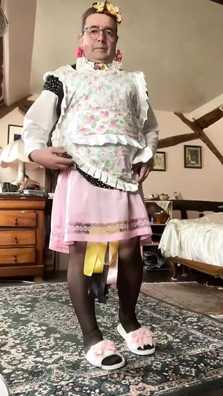 In a gardener's outfit for an afternoon