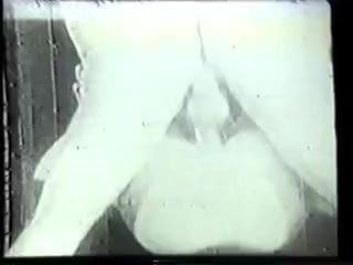 Vintage clip of southern belle with big tits sucking husband&#039;s big cock on sofa