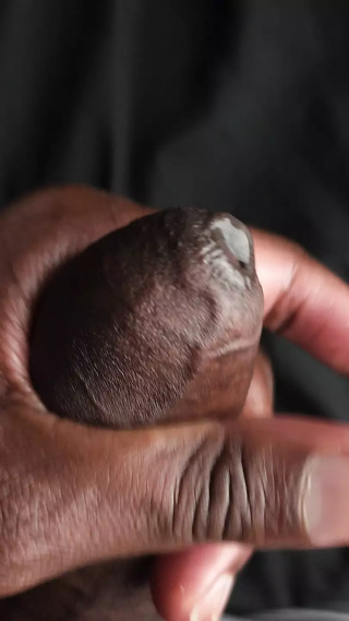 grabbing and rubbing on black african pulsating cock close up pre cum
