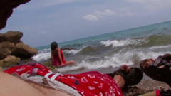 Double penetration threesome at the beach