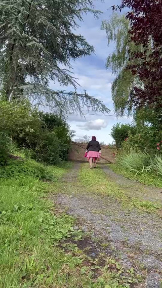 Dressed in a little pink pleated skirt for an evening out