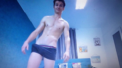 Cute young muscle guy in shorts with huge bulge in shorts