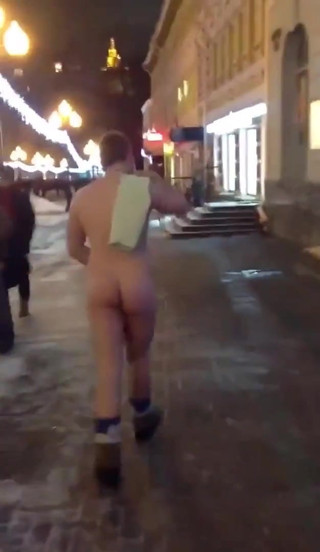 Naked on a snowy street