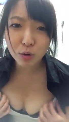 Cute Asian girl shows tits