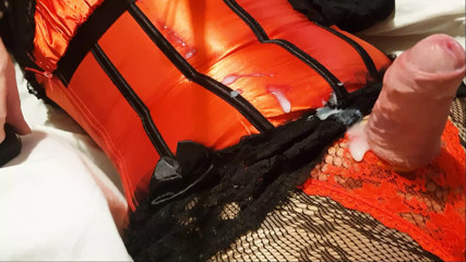 Crossdresser CorsetLoverCD wanks and cums in red sati corset thumbnail