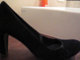 Cumshot into well worn heels