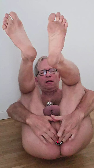 Exhibition of the masturbating slave