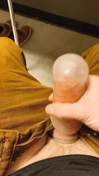 Playing with Tenga Spinner in office at work