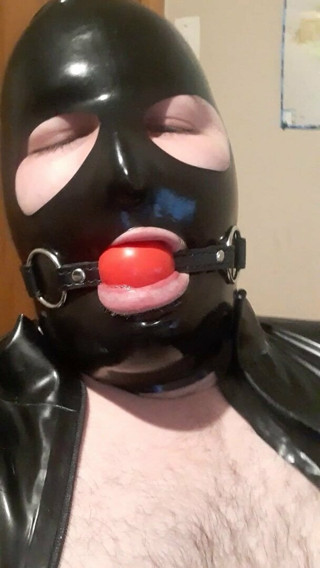 Latex wank while gagged