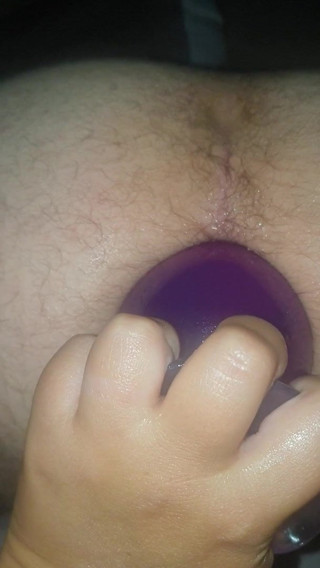 Hubby getting our big anal plug shoved in for the 1st time