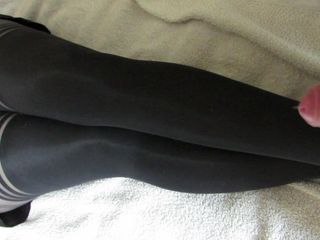 Thick cum on her nylon legs, tights layered over stockings