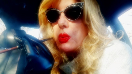 CAR SMOKER DOING IT WITH A MORE120 MENTHOL IN A CIGARETTE HOLDER - TG CD SMOKING thumbnail