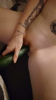 Playful private erotic adventure with a cucumber in front of the camera