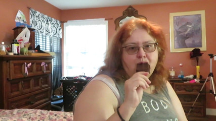 BBW nurse Vicki enjoys eatting a chocolate vanilla ice cream popsiscle
