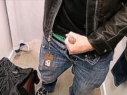 Leather Jacket wank and cum in store changing rooms. 