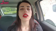 Good looking Petra smoking in her car