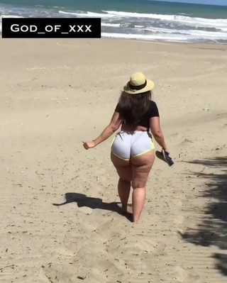 Pawg walking on the beach