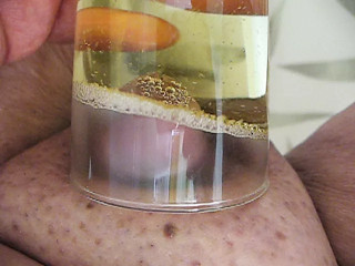 Soaking my cock in pee