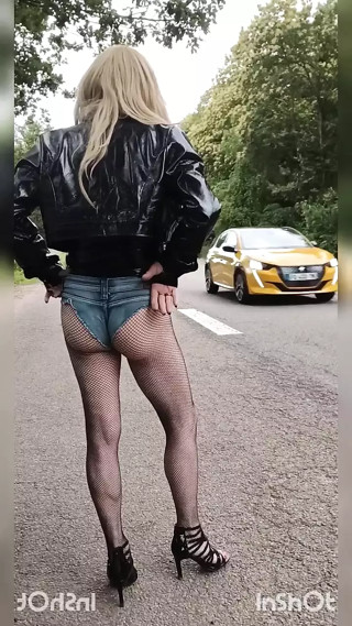 walk in town and roadside solicitation of a sissy in a whore's outfit, vinyl top and mini denim shorts
