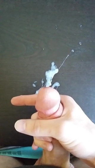 Boy cumming on table