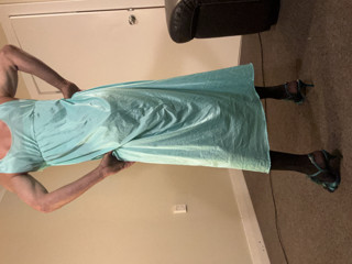 Beautiful green night gown with a sexy black body suit underneath