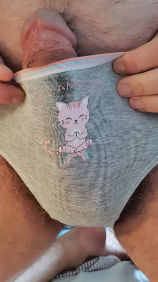 Wanking and moaning in teenie panties
