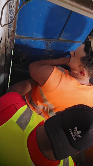 Two Construction Workers Making Out in the Company Bathroom.