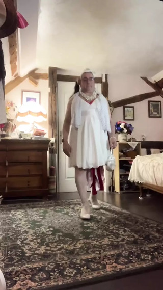 In an outfit with a white evening dress for one evening