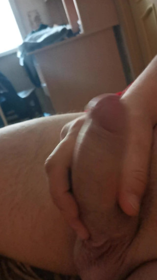 Jerking off in bed and cumming