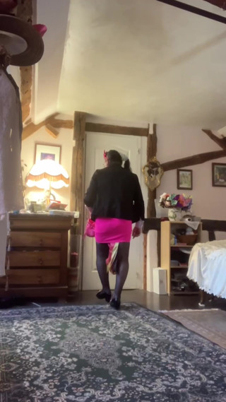 Dressed with a short pink skirt for a night out