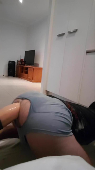 Fit guy rides big dildo